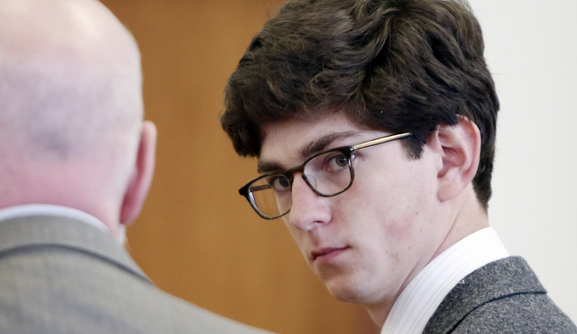 Owen Labrie in court while sitting next to his attorney Jay Carney. The Associated Press