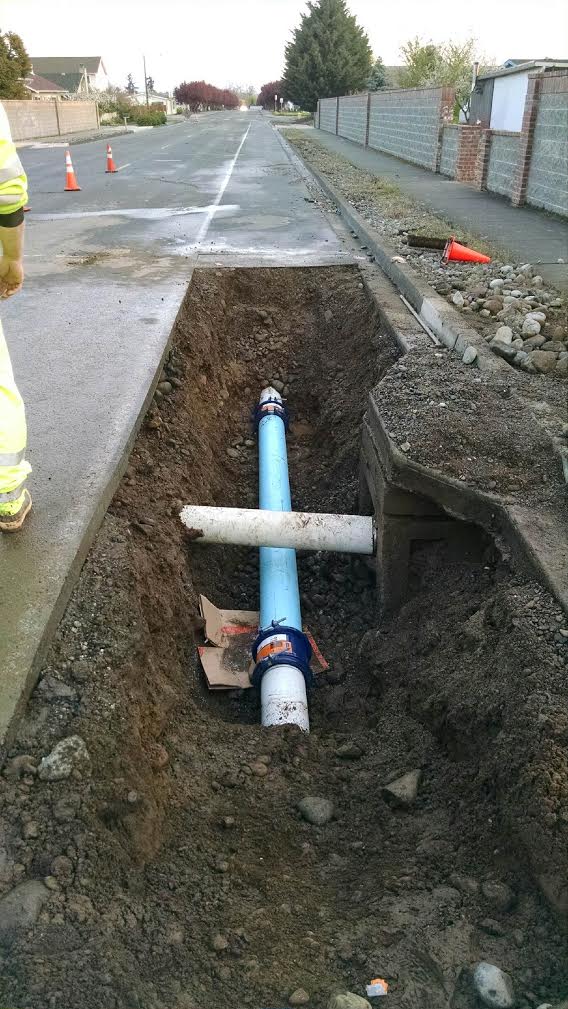 A 10-foot crack in an 8-inch water pipe between West Spruce Street and West Fir Street caused street flooding. (City of Sequim)