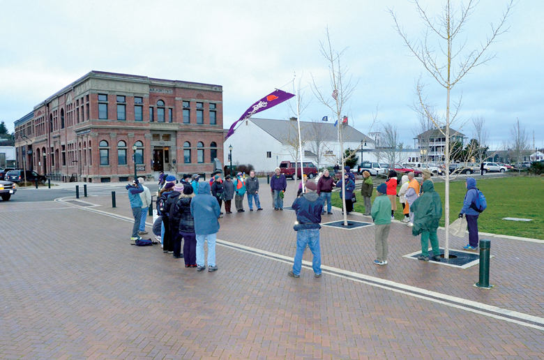 About 30 people participate in a march honoring Dr. Martin Luther King