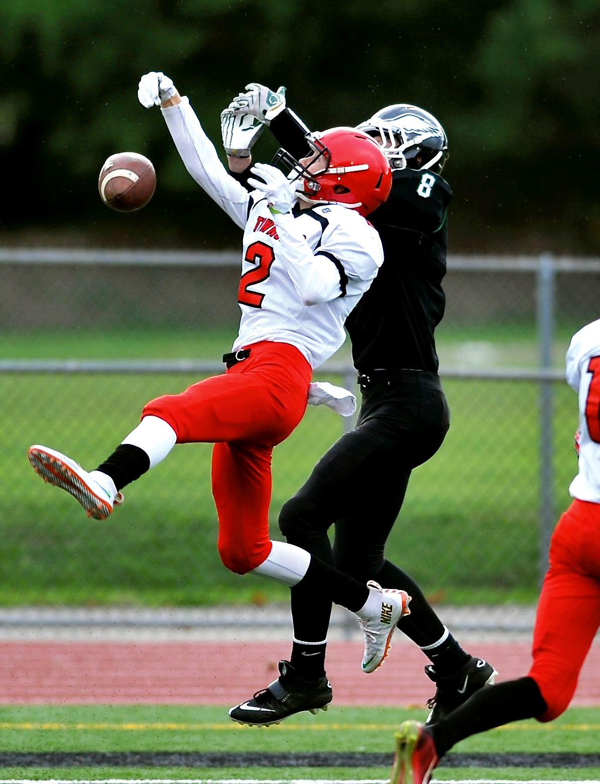 Port Townsend's Carson Marx (2) breaks up a pass intended for Klahowya's Nate Hough during an Olympic League 1A game at Silverdale Stadium in September. (Jeff Halstead/for Peninsula Daily News)