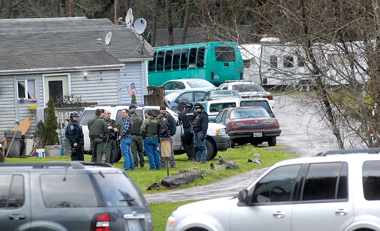 Law enforcement personnel stage at the scene of a standoff and reported hostage situation at the Salt Creek RV Park near Joyce on Tuesday. (Keith Thorpe/Peninsula Daily News)