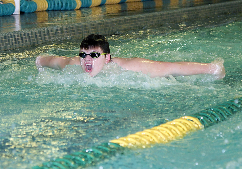 Port Angeles' Noah Sinnes swims the butterfly during the 200-yard individual medley. (Patty Reifenstahl)