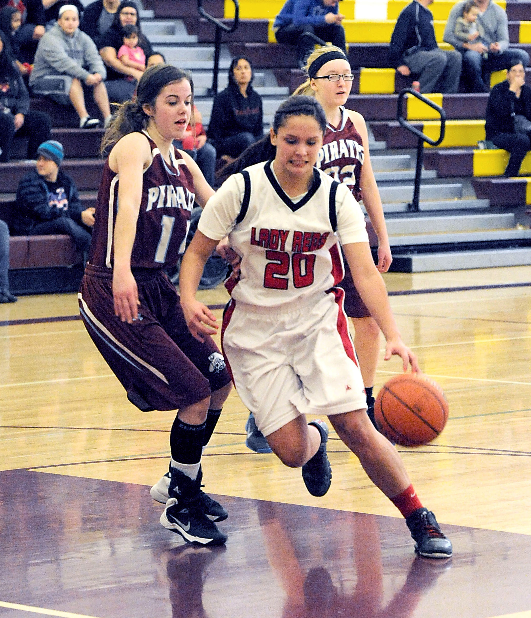 Neah Bay's Kaela Tyler drive through the lane during the Red Devils' regional win over Bickleton last week. (Lonnie Archibald/for Peninsula Daily News)