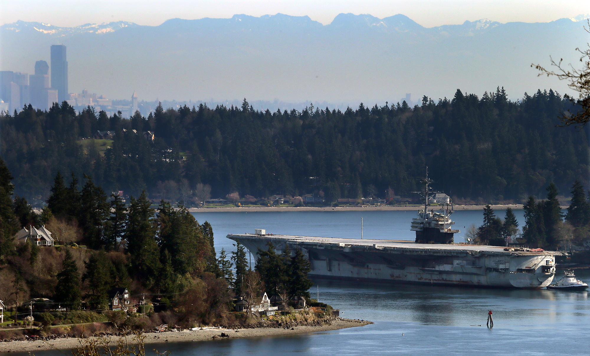 The USS Ranger passes through Bremerton's Rich Passage for the last time on Thursday. (AP Photo/Kitsap Sun