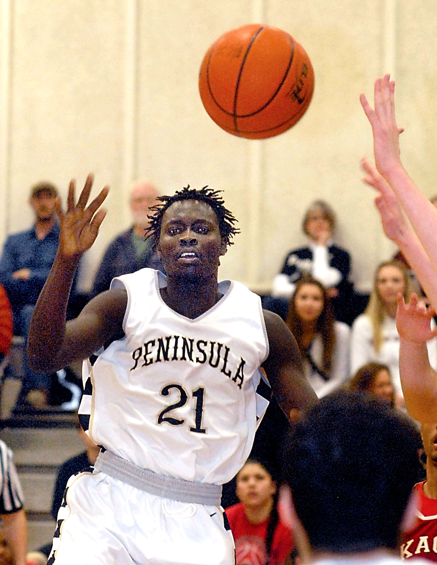 Jal Deng (21) and teammate Jeremiah Hobbs often must change their sweat-soaked jerseys at halftime of Peninsula College's games. (Keith Thorpe/Peninsula Daily News)