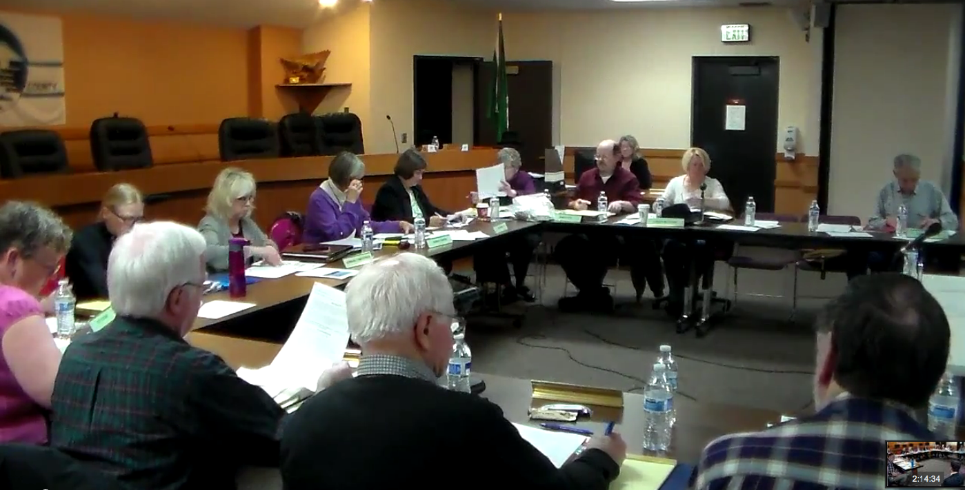 Clallam County Charter Review Commission  members begin their March 11 meeting. (Stephanie Noblin)