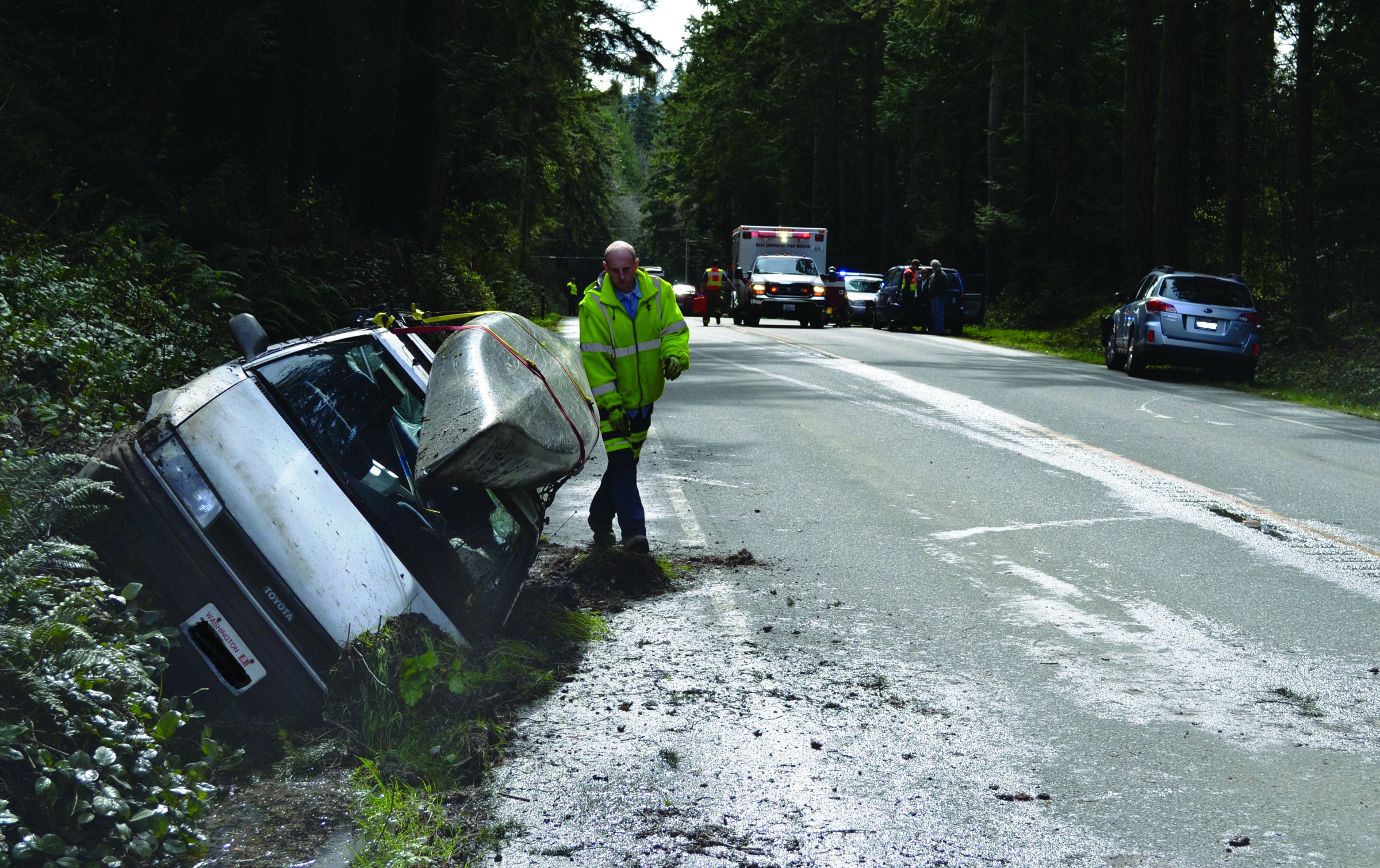 The right front tire blew on this Toyota Corolla sedan