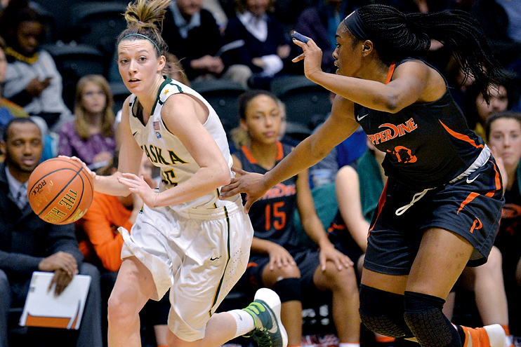 Alaska-Anchorage's Jessica Madison dribbles around a Pepperdine defender earlier this season. Madison