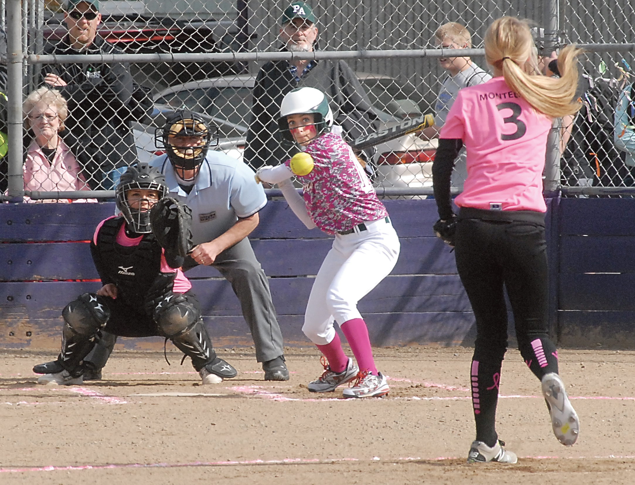 Port Angeles' Taylar Clark eyes the pitch from Sequim's Allysen Montelius