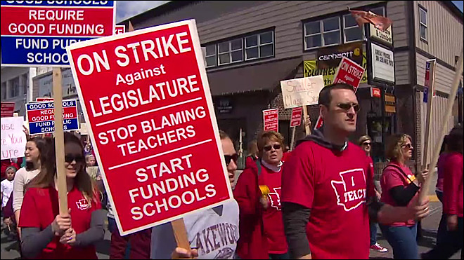 Activists in Olympia protesting "legislative inaction on funding education." (KOMO News)