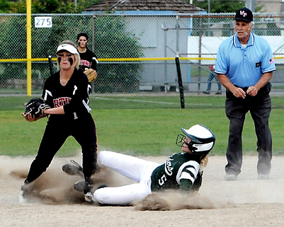 Port Angeles' Natalie Steinman slides safely into second as Orting's Sydney Banyai covers the bag during the eighth inning. Steinman went on to score the winning run on Nizhoni Wheeler's base hit