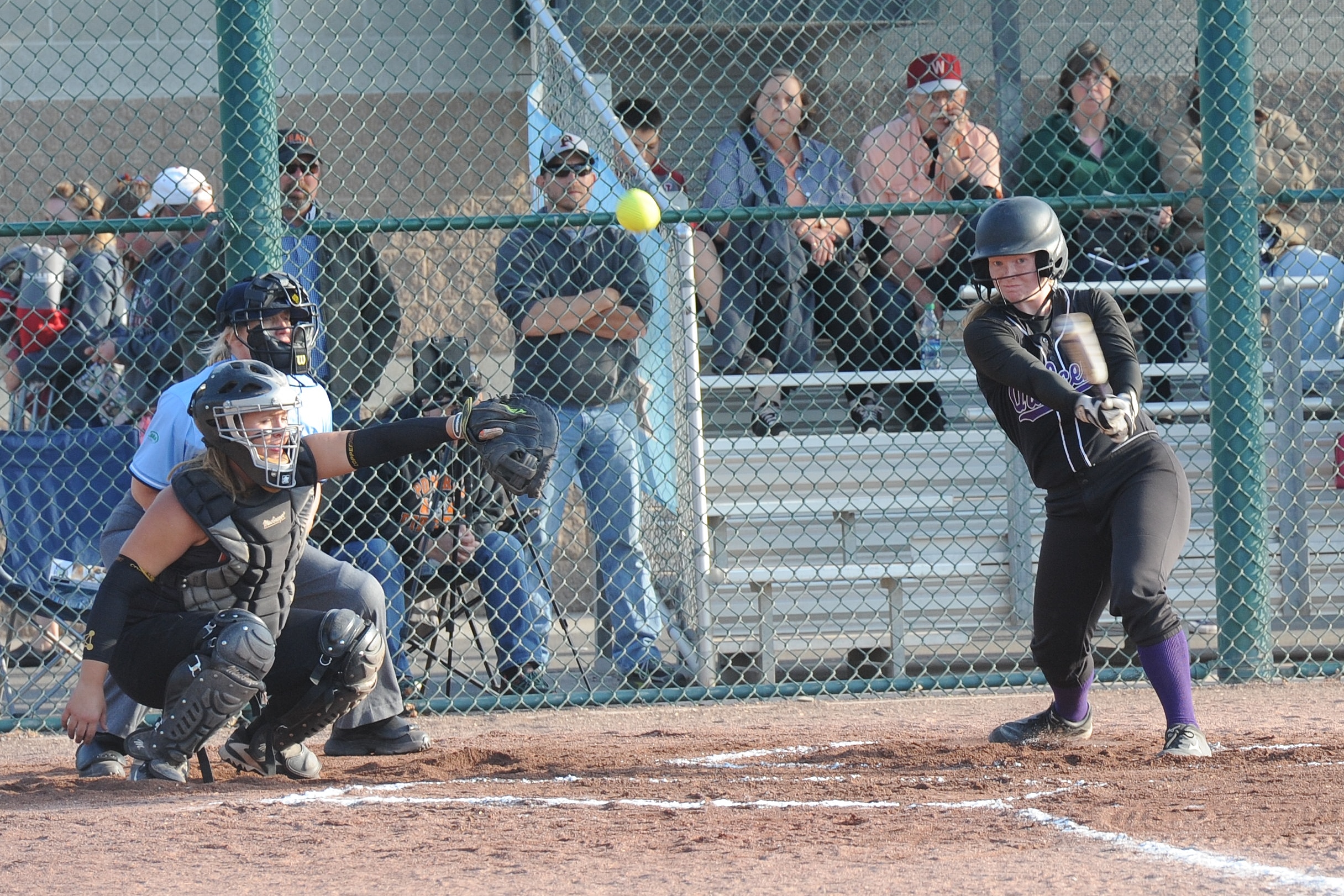 Quilcene's Katie Bailey hits the ball foul during the Rangers' 5-4 loss to Pomeroy in the Class 1B state semifinals. Quilcene rebounded to earn the school's fourth-straight state trophy by finishing third for the second straight season. (Lonnie Archibald/for Peninsula Daily News)