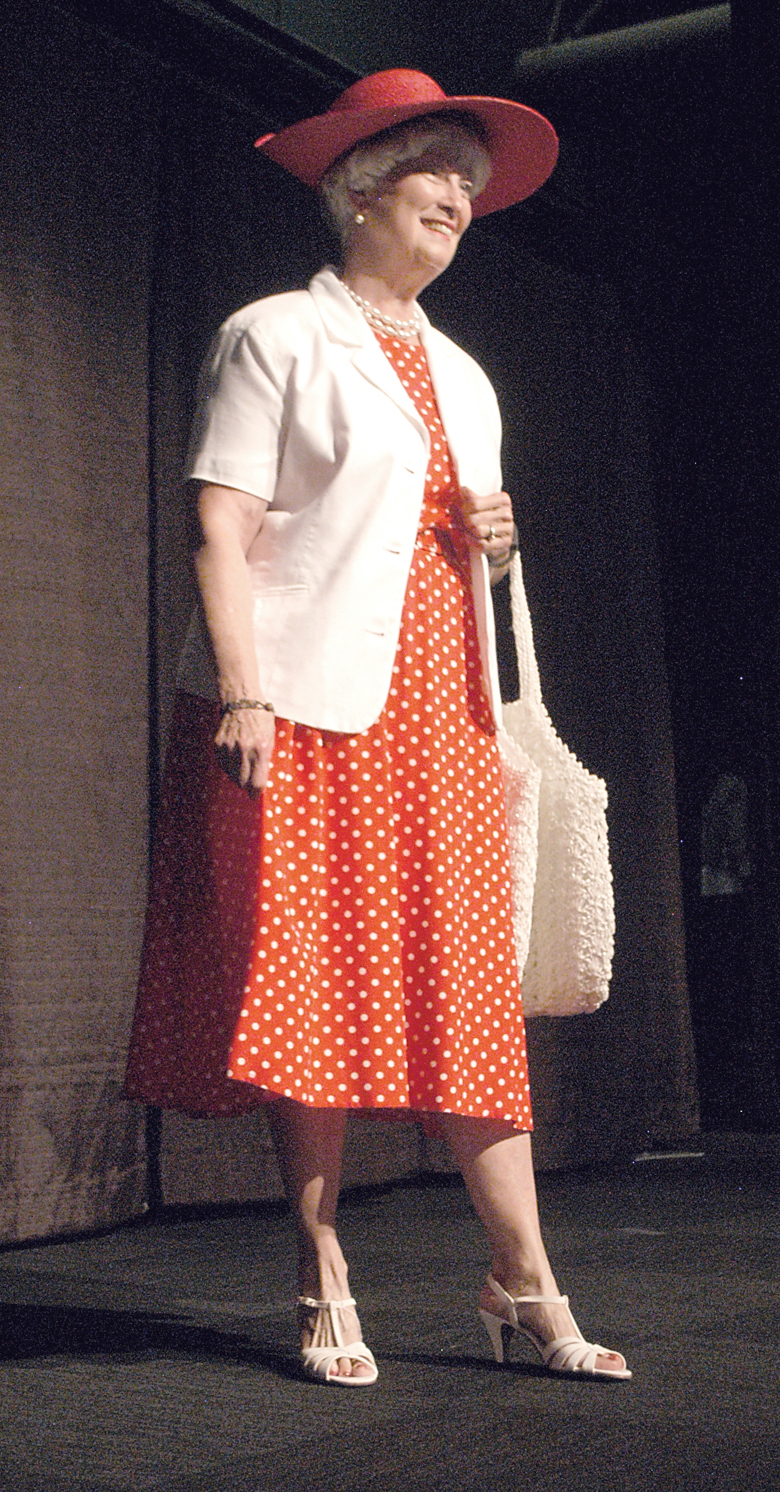 Wanda Bean of Sequim models clothing available at the Sequim-Dungeness thrift shop last week during the guild's annual luncheon and fashion show at 7 Cedars Casino in Blyn. (Chris McDaniel/Peninsula Daily News)