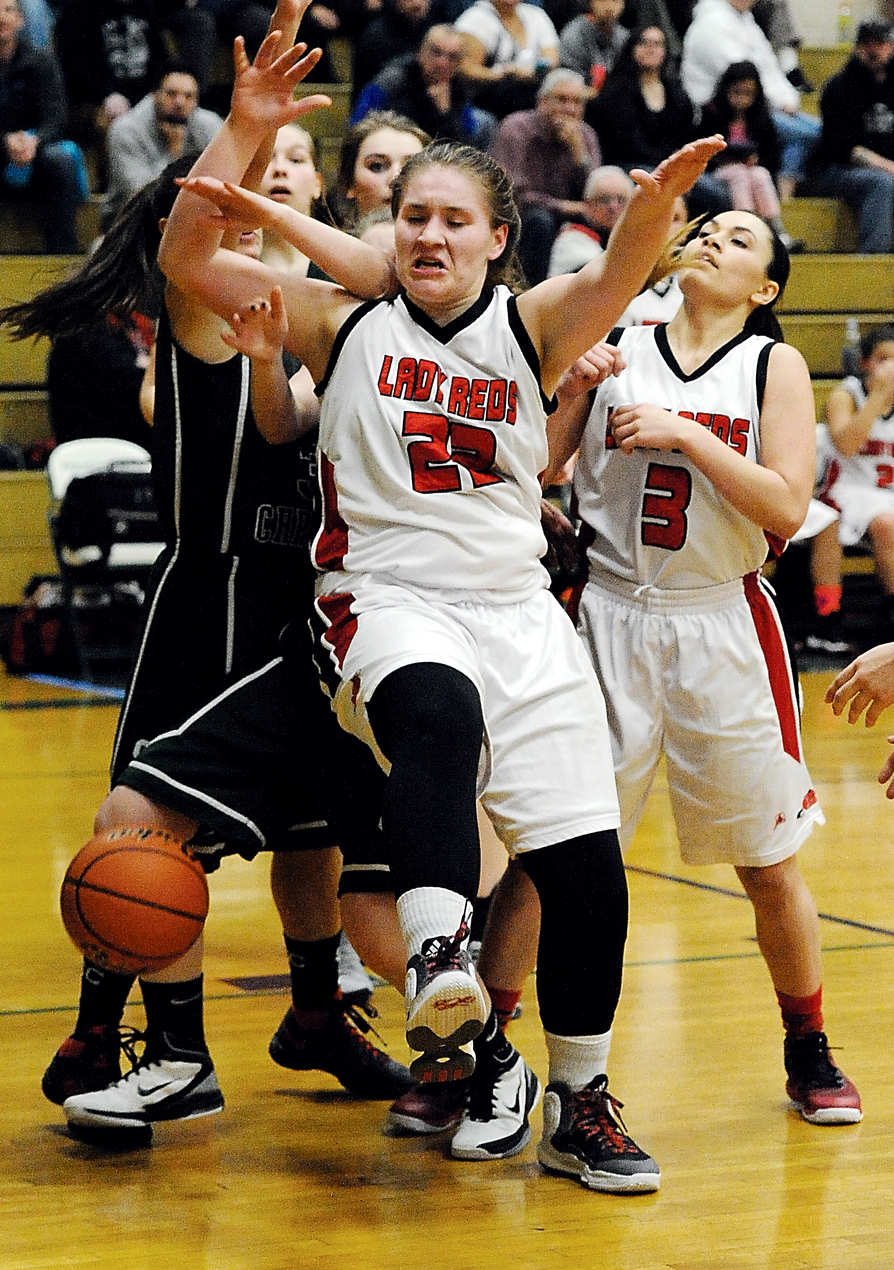 Neah Bay senior Faye Chartraw (22) averaged a double-double with 19.4 points and 10.6 rebounds and helped lead the Red Devils to a fifth-place finish at state. (Lonnie Archibald/for Peninsula Daily News)