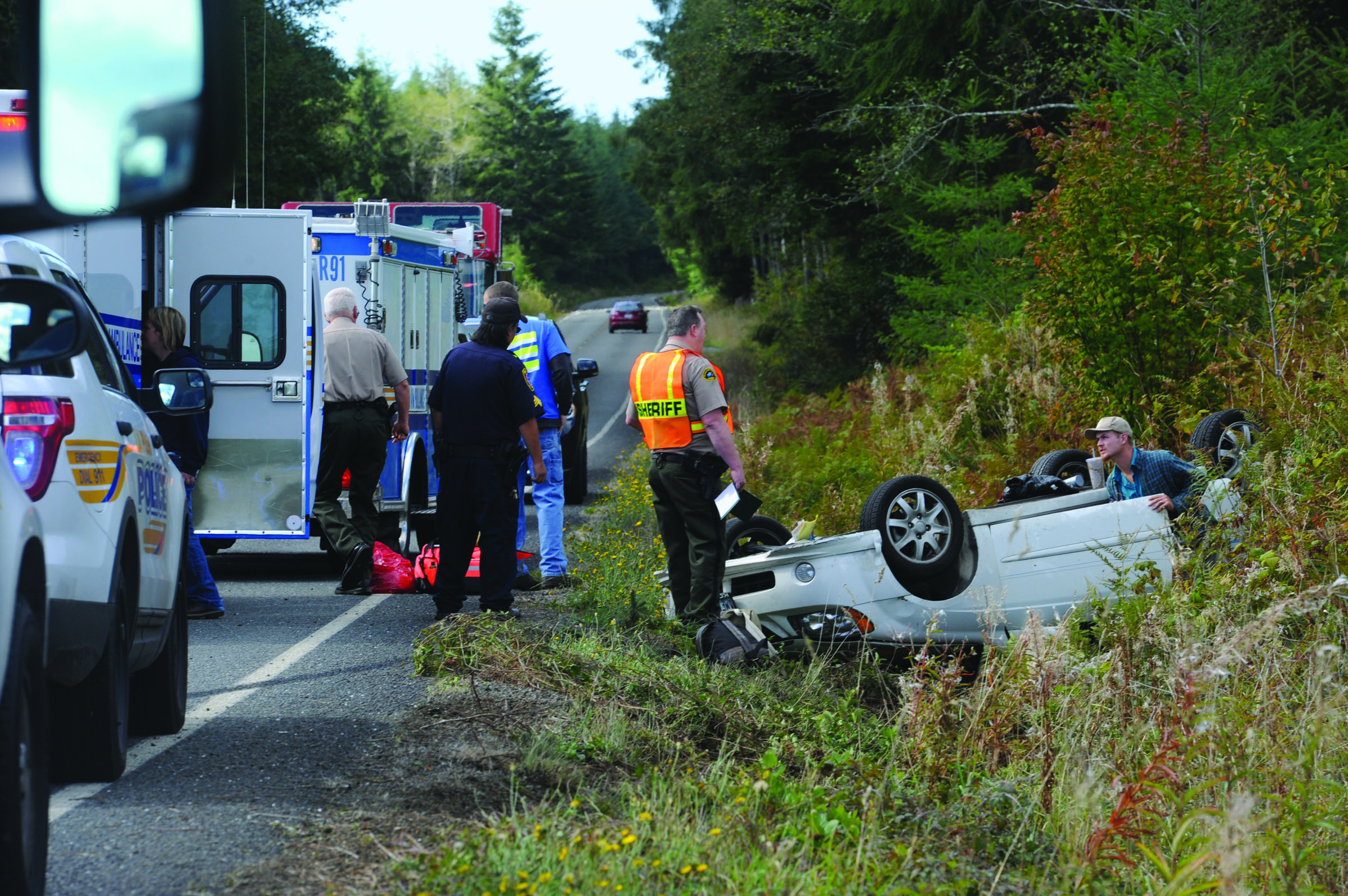 No injuries were reported after a single-car rollover wreck at 12:05 p.m. Tuesday on state highway 110 near the junction with Wilson road. — Lonnie Archibald/for Peninsula Daily News