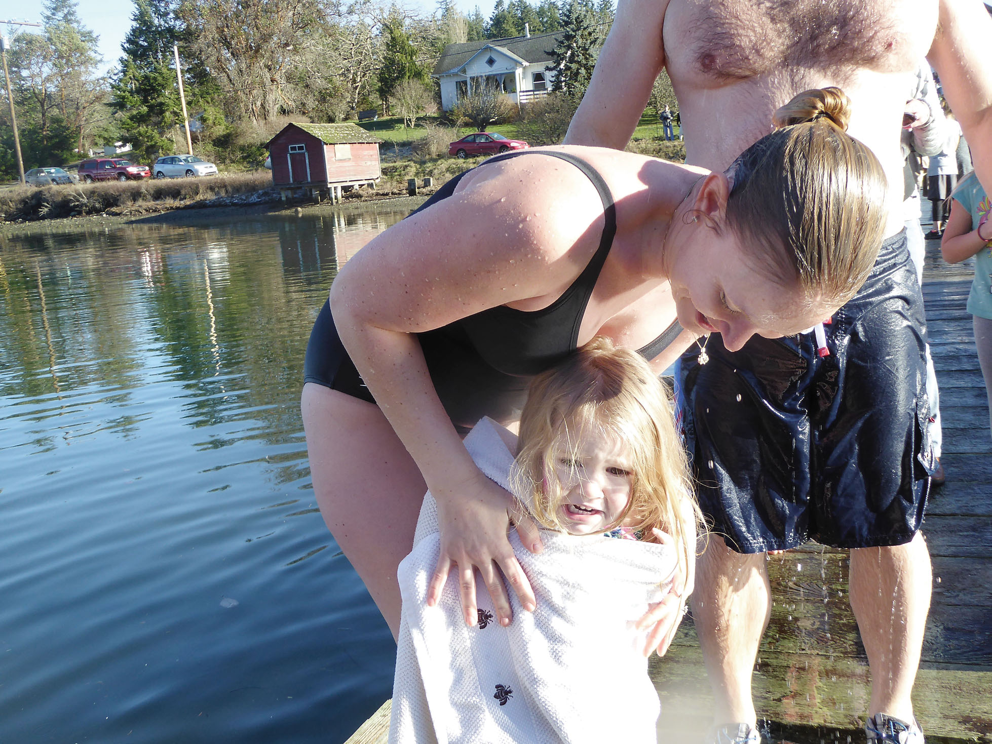 Meghan Corotsby of Seattle dries her daughter Campbell