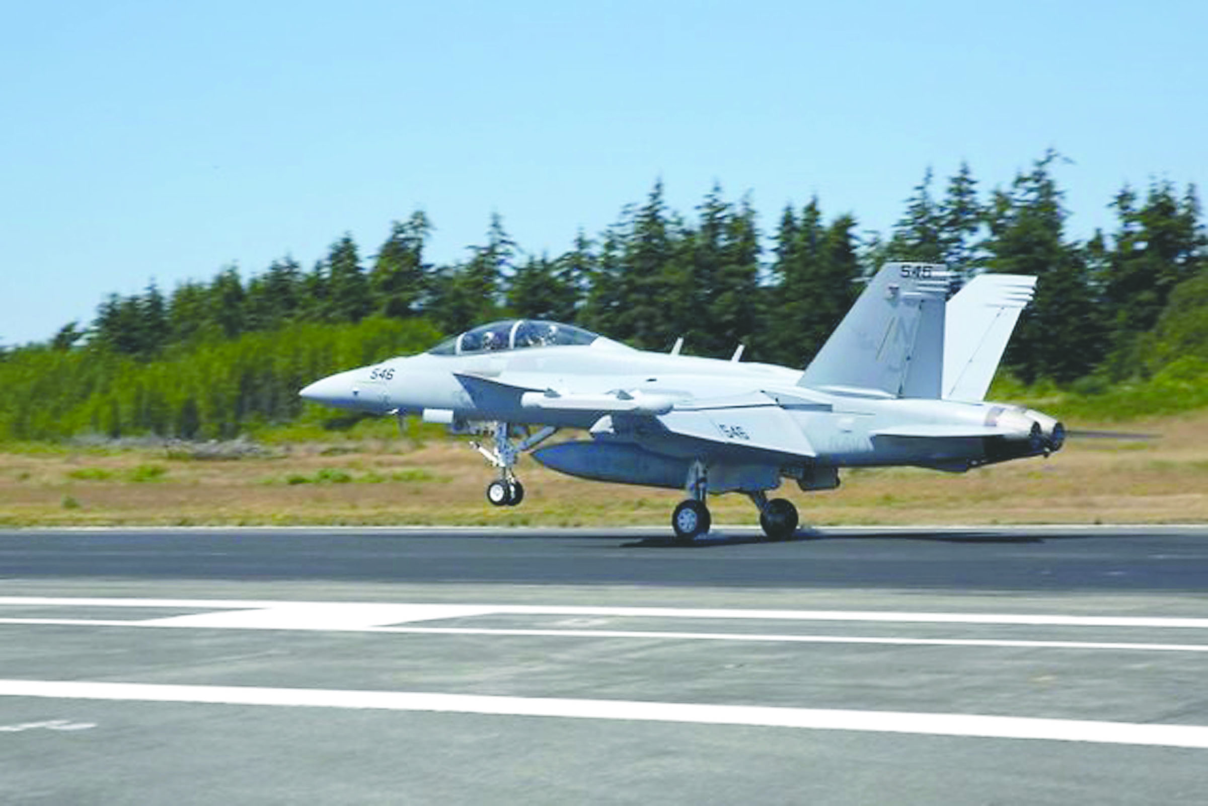 An EA-18G Growler assigned to Electronic Attack Squadron (VAQ) 129 lands on Naval Air Station Whidbey Island's Ault Field. — U.S. Navy ()