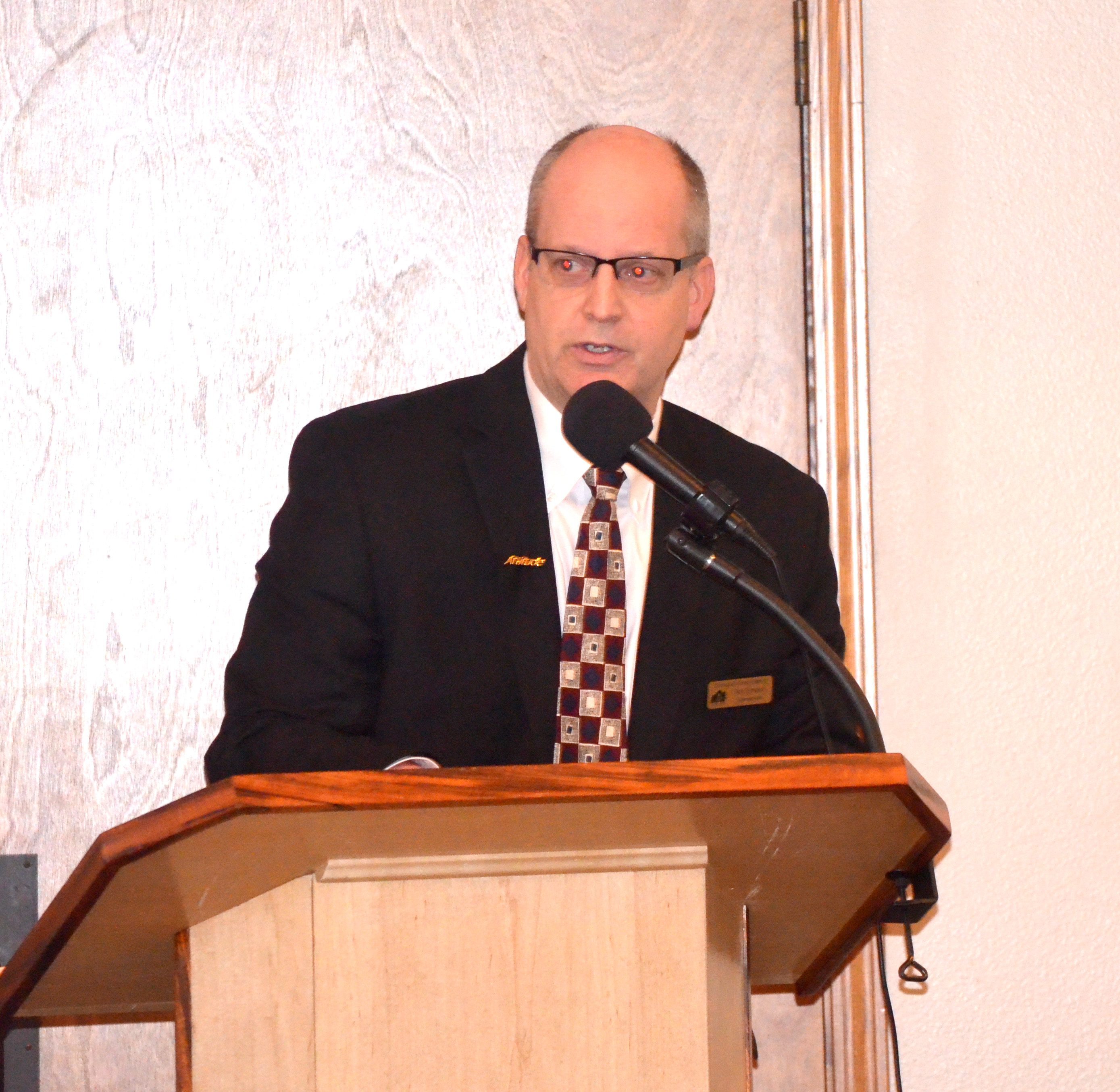 Chimacum Schools Superintendent Rick Thompson addressed the Jefferson County Chamber of Commerce about the district's upcoming school bond. (Charlie Bermant/Peninsula Daily News)