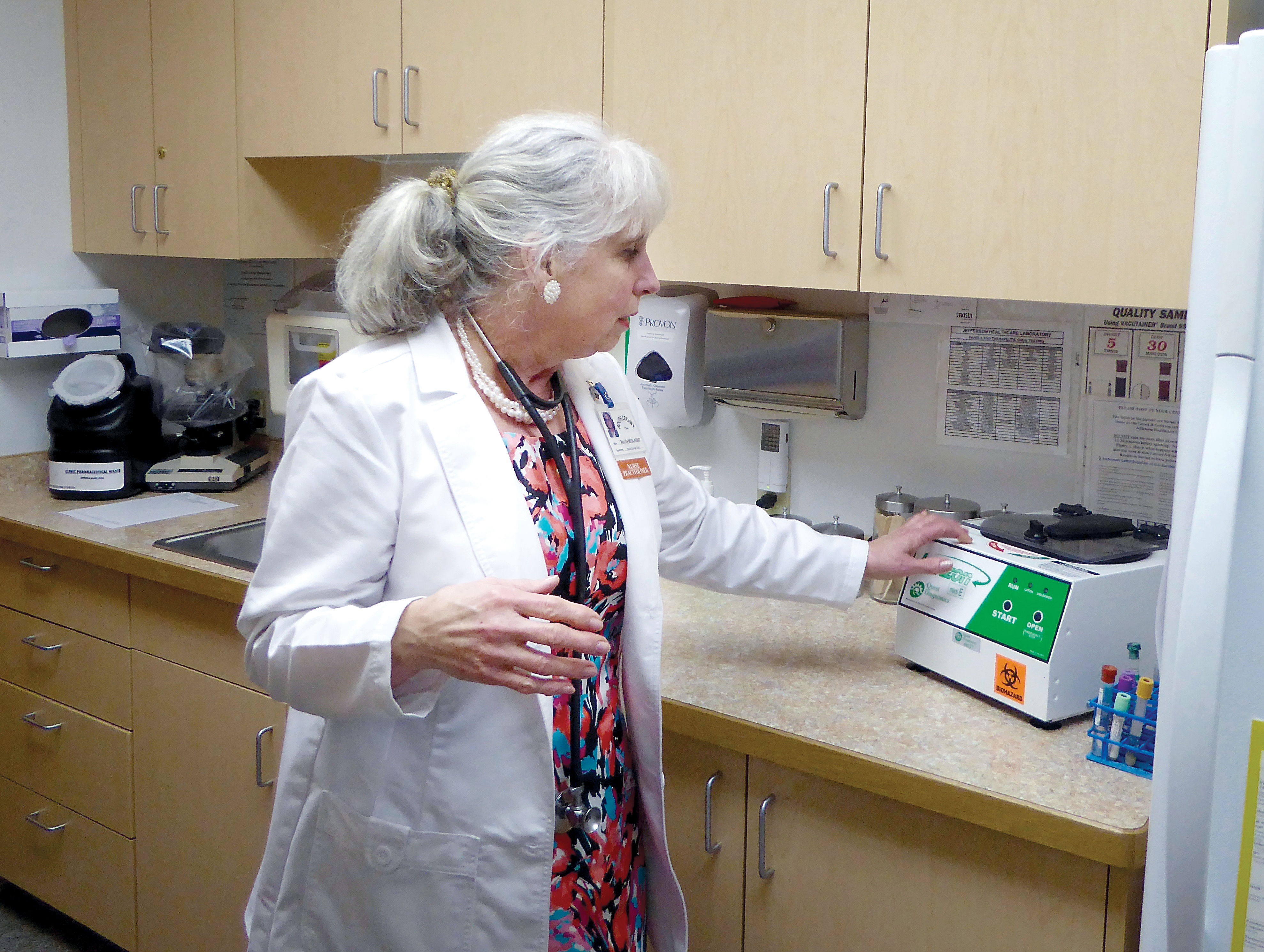 South County Medical Clinic director Merrily Mount waits for a test result in the clinic’s lab. The service has been operating for 20 years. — Charlie Bermant/Peninsula Daily News ()