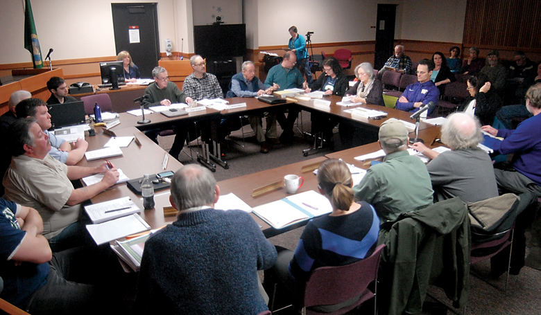 Members of the Clallam County Trust Lands Advisory Committee convene Friday at the Clallam County Courthouse. (Keith Thorpe/Peninsula Daily News)