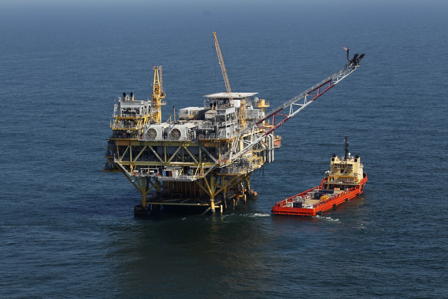 A rig and supply vessel in the Gulf of Mexico