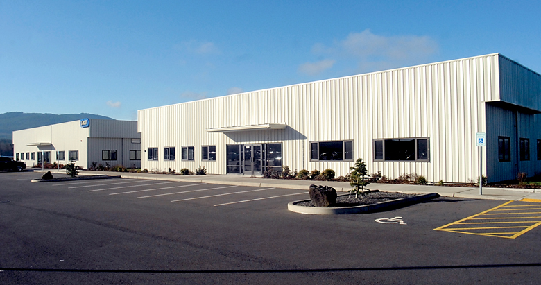 The currently empty 2220 Building sits on the Port of Port Angeles Composites Manufacturing Campus near William R. Fairchild International Airport in Port Angeles. The port hopes to use the building as a composites recycling center. (Keith Thorpe/Peninsula Daily News)