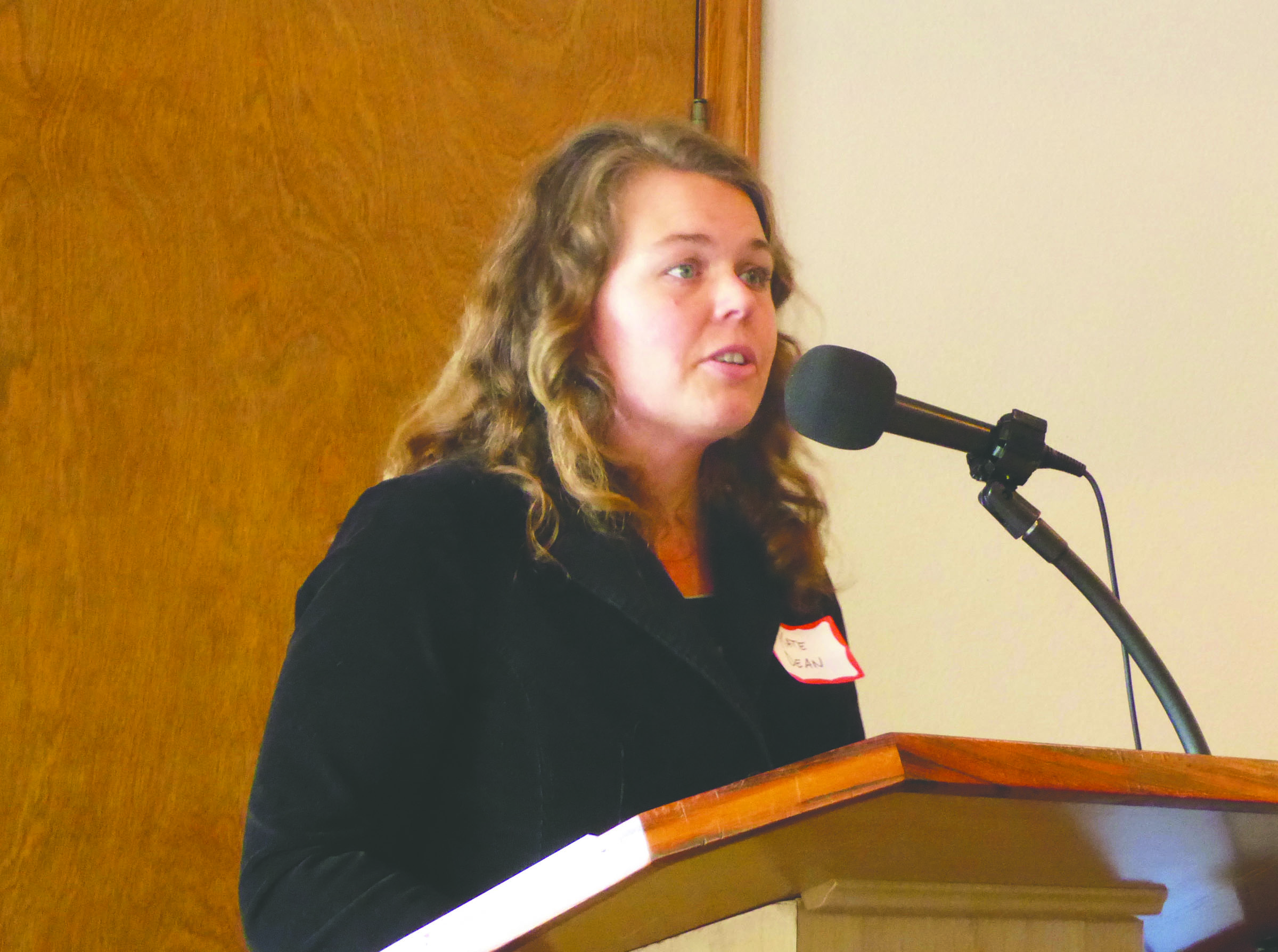 North Olympic Peninsula Resource Conservation & Development Council director Kate Dean addresses the Jefferson County Chamber of Commerce on Monday on climate change. — Charlie Bermant/Peninsula Daily News ()