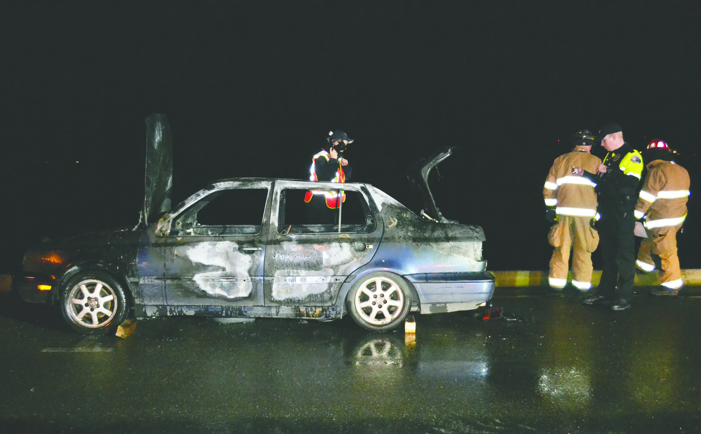 This Volkswagen Jetta was badly damaged early Sunday morning after a fire started in its back seat. (East Jefferson Fire-Rescue)