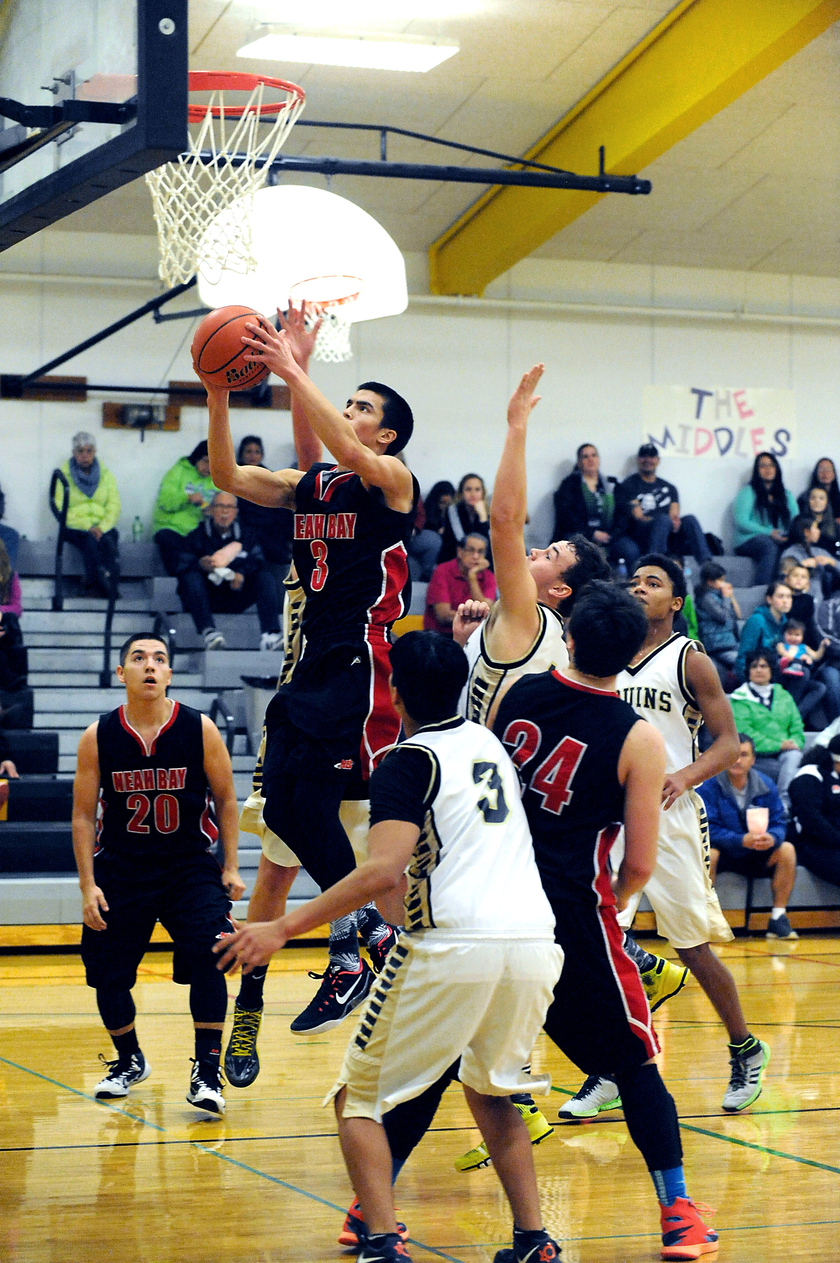 Neah Bay's overall play has improved since moving Abraham Venske (3) from the perimeter to the post. (Lonnie Archibald/for Peninsula Daily News)