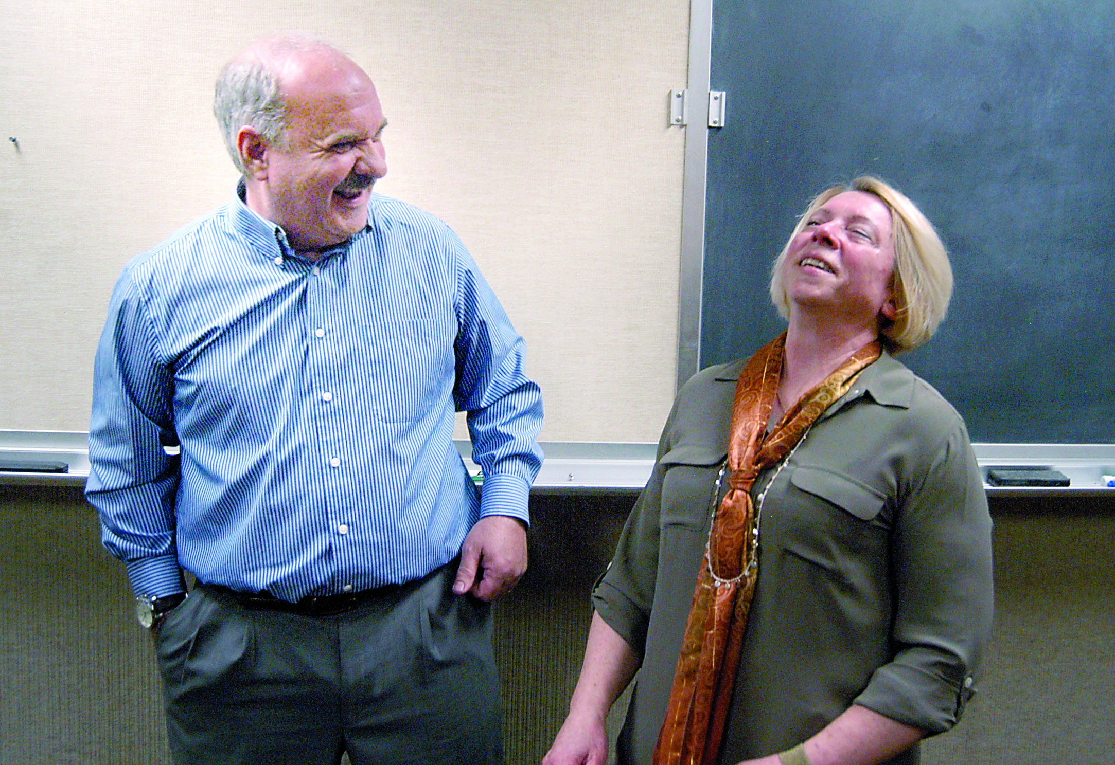 Steve Burke and Port of Port Angeles Commissioner Connie Beauvais share a light moment Friday after Beauvais and Commissioner Colleen McAleer selected Burke to fill a vacancy on the port commission. (Paul Gottlieb/Peninsula Daily News)