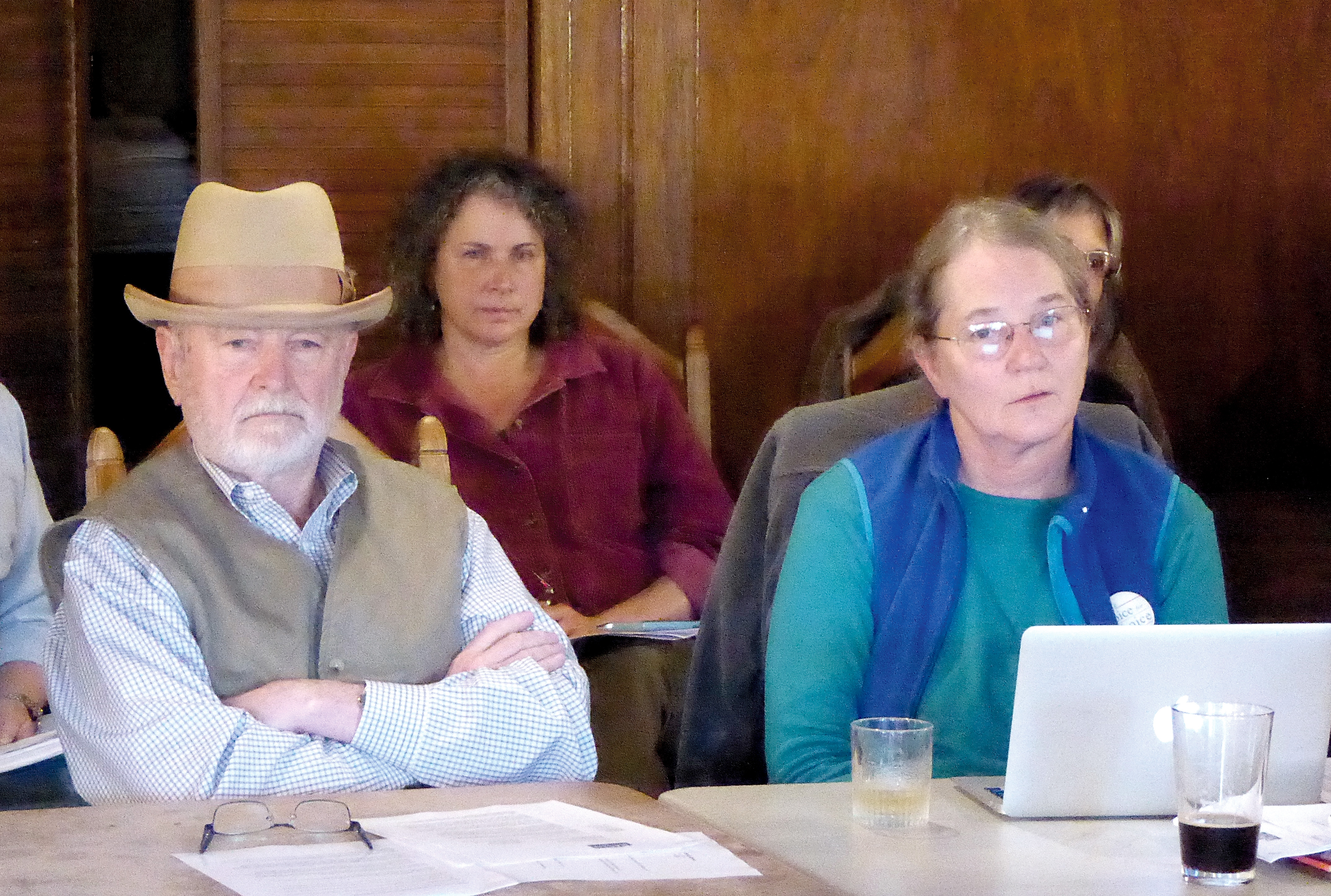 Jefferson Healthcare Commissioner Chuck Russell and citizen Debbie Jahnke listen to a presentation at a meeting Thursday where abortion services at the hospital in Port Townsend were discussed. —Photo by Charlie Bermant/Peninsula Daily News ()