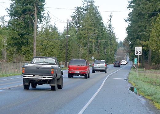 This 50 mph speed limit area on state Highway 19 will be lowered to 40 mph. (Charlie Bermant/Peninsula Daily News)