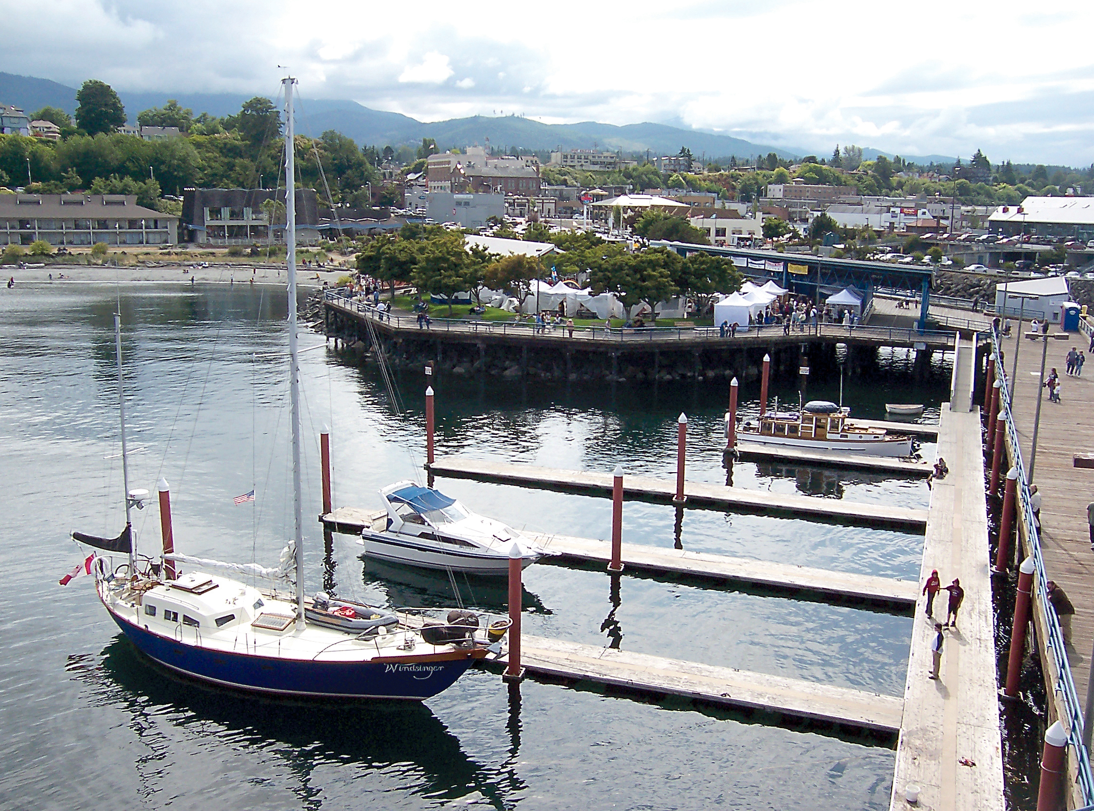 Outdated moorage floats adorn Port Angeles City Pier during a past Arts in Action Festival. (Keith Thorpe/Peninsula Daily News)