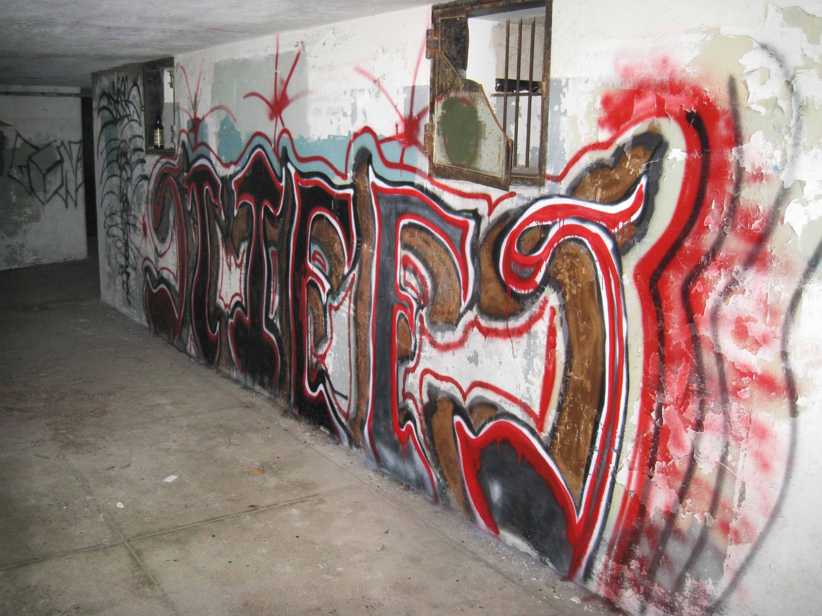 One of the fresh graffiti that cover walls of one of Fort worden’s historical bunkers is shown in this Port Townsend Police Department photo. ()