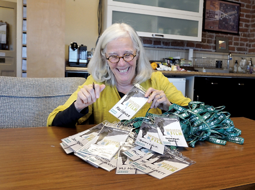 Port Townsend Film Festival Executive Director Janette Force prepares for the 200 expected guests at this weekend's second annual Women in Film Festival. (Charlie Bermant/Peninsula Daily News)