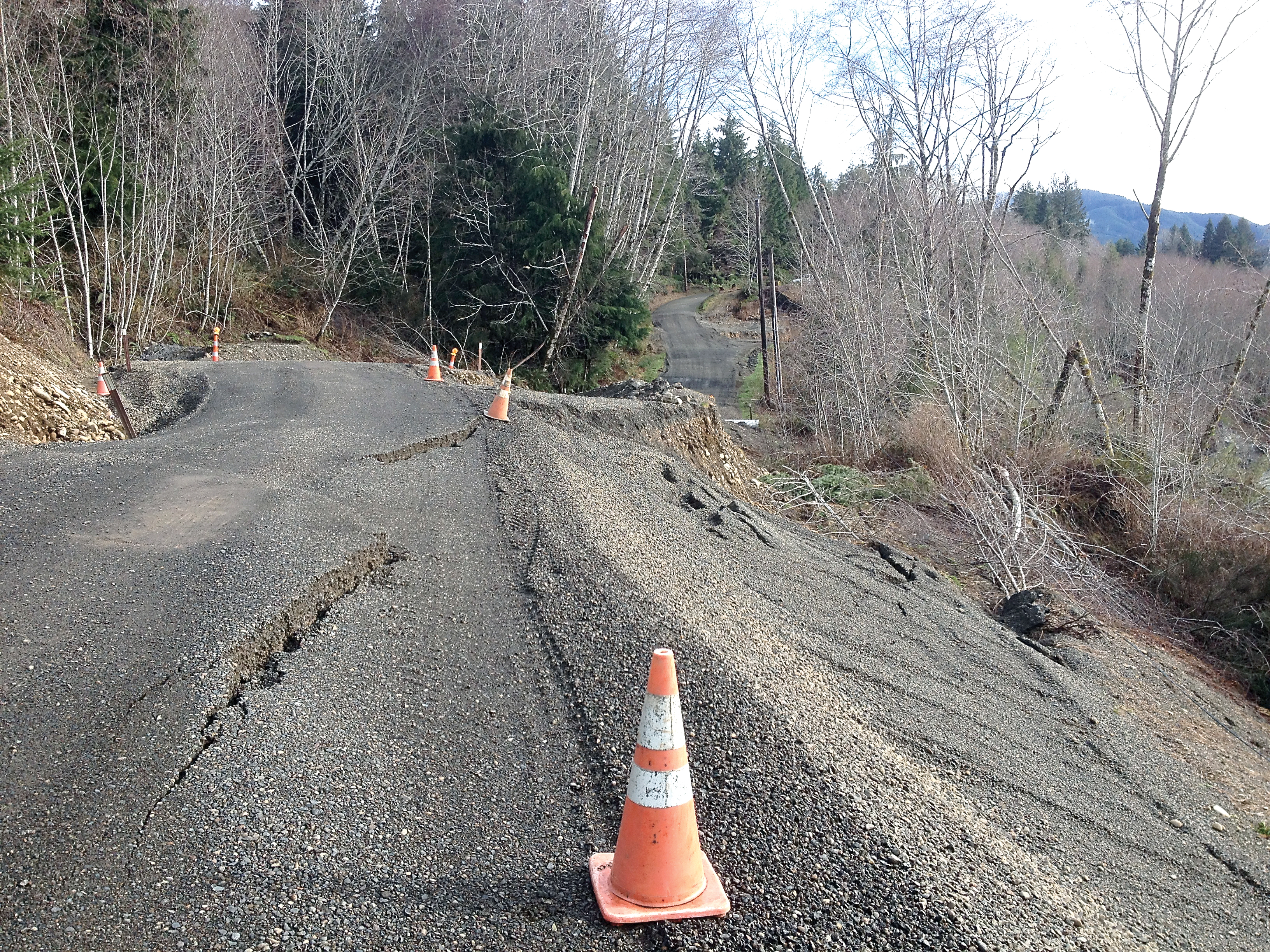 Jefferson County officials are seeking grants to replace a stretch of Undi Road that has been severely damaged by landslides. (Monte Reinders)