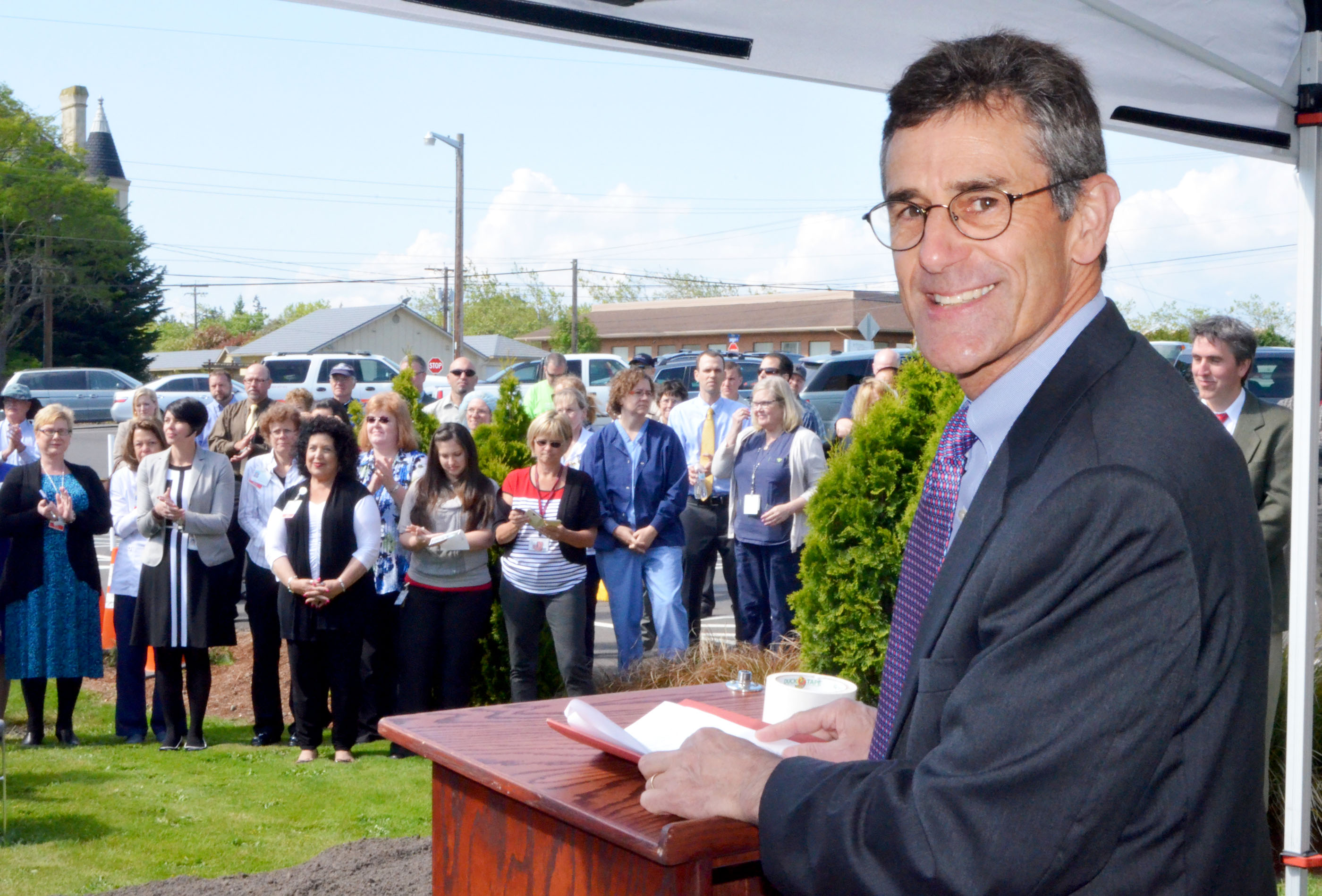 Jefferson Healthcare CEO Mike Glenn finishes his remarks at the groundbreaking of the new Emergency and Special Services Building for the Port Townsend hospital Monday. (Charlie Bermant/Peninsula Daily News)