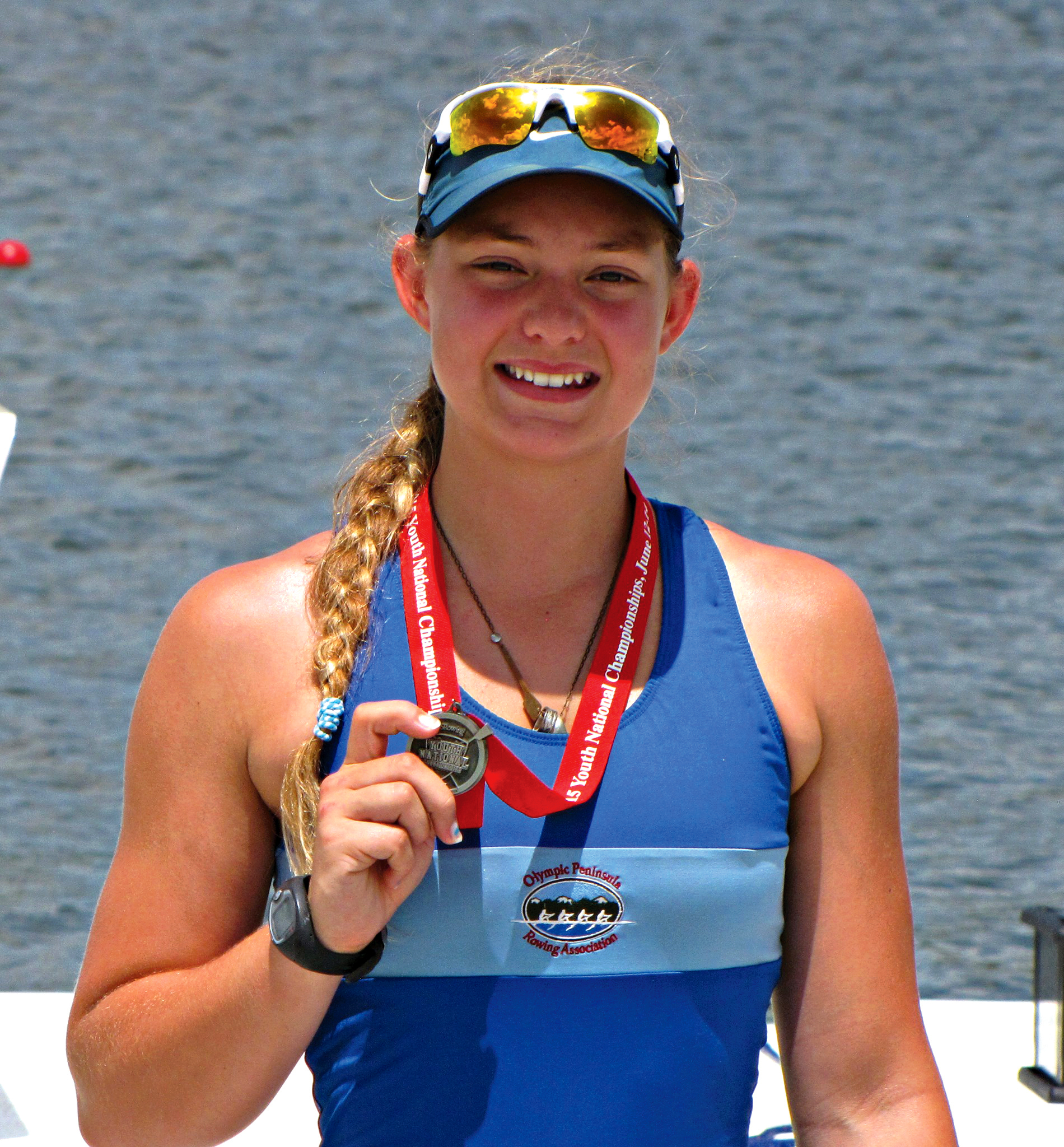 Elise Beuke holds the silver medal she won at the U.S. Rowing Junior National Championships. (Mary Beth Beuke)