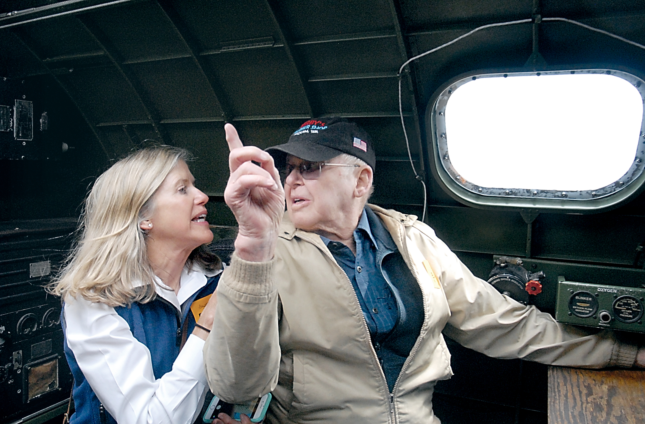 Army Air Corps veteran Miram Ritchie of Sequim points out features of the B-17 Flying Fortress to his daughter