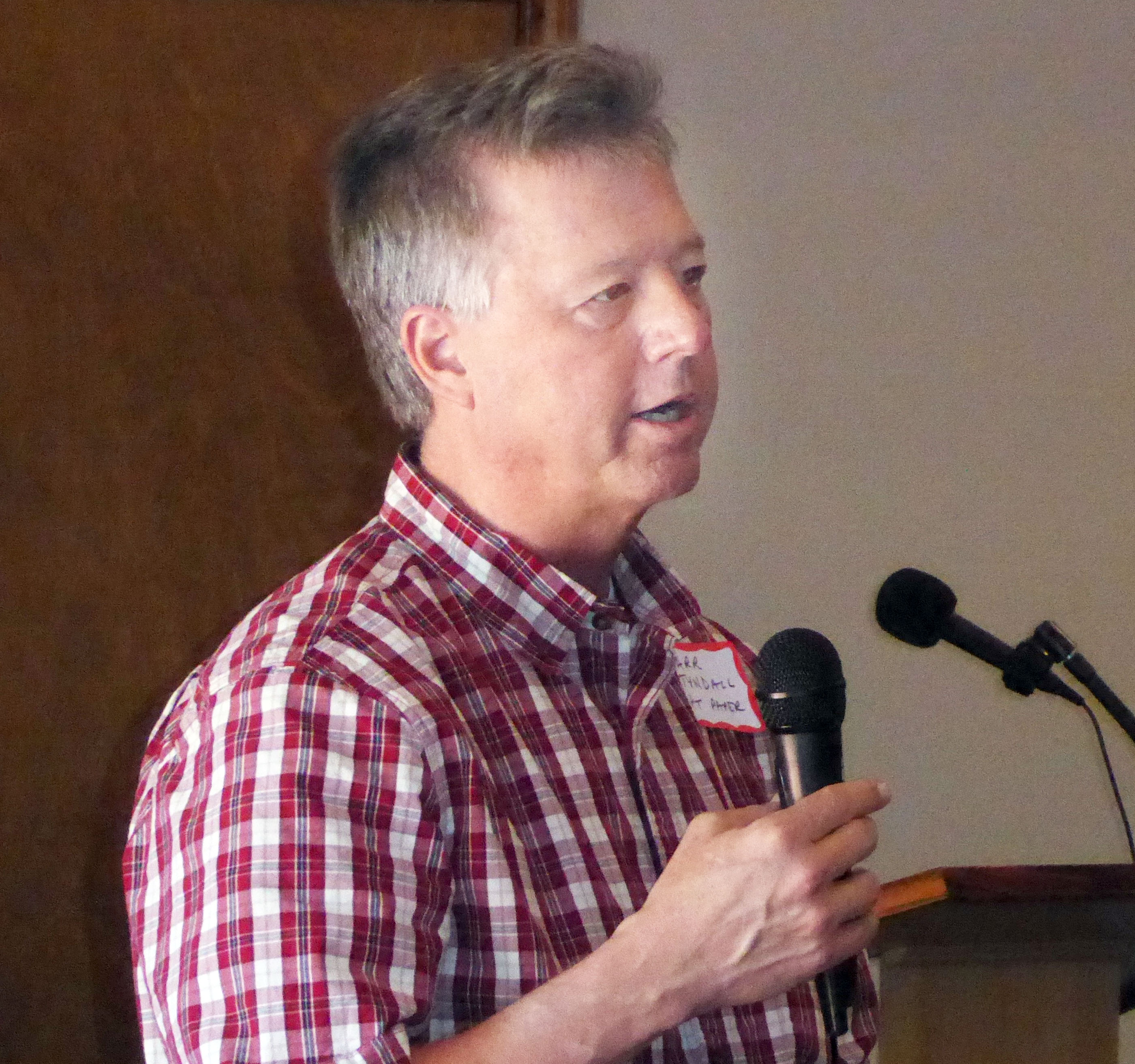 Port Townsend Paper Corp. General Manager Carr Tyndall addresses the Jefferson County Chamber of Commerce in Port Townsend on Monday. —Photo by Charlie Bermant/Peninsula Daily News ()