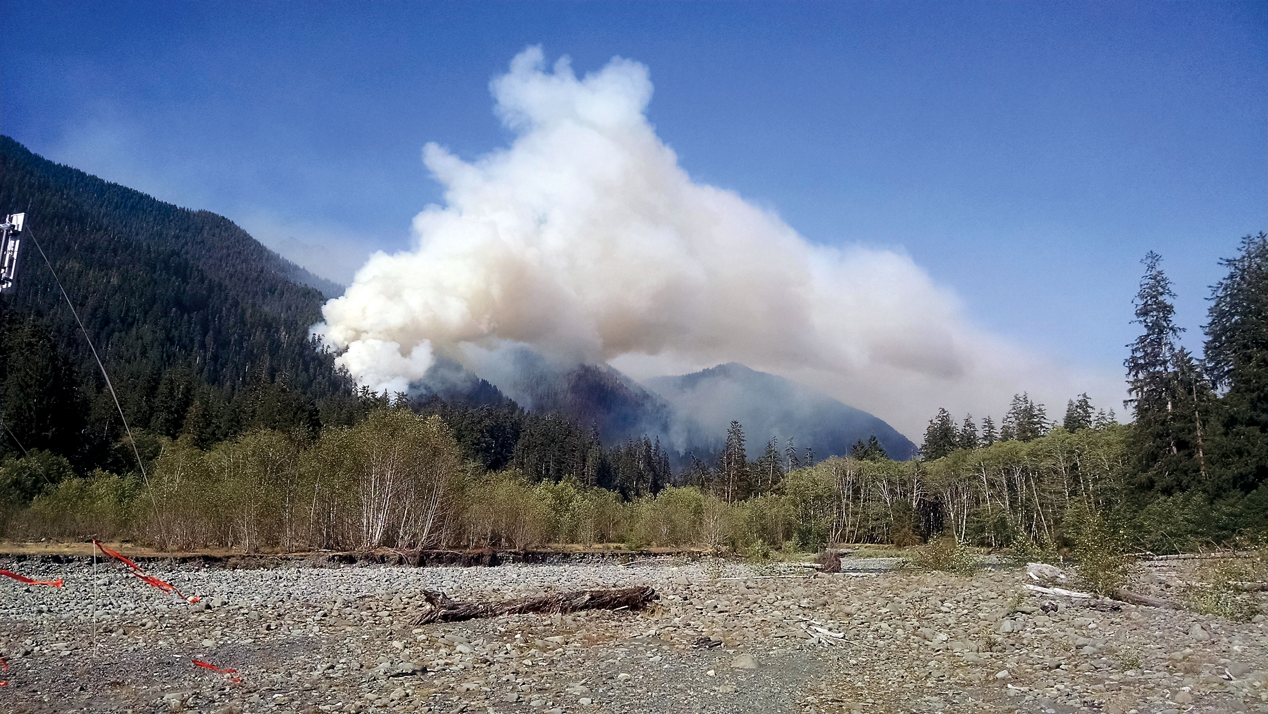 Smoke billows from the Paradise Fire on slopes north of the Queets River in Olympic National Park in this photo taken Saturday afternoon. —U.S. Forest Service photo