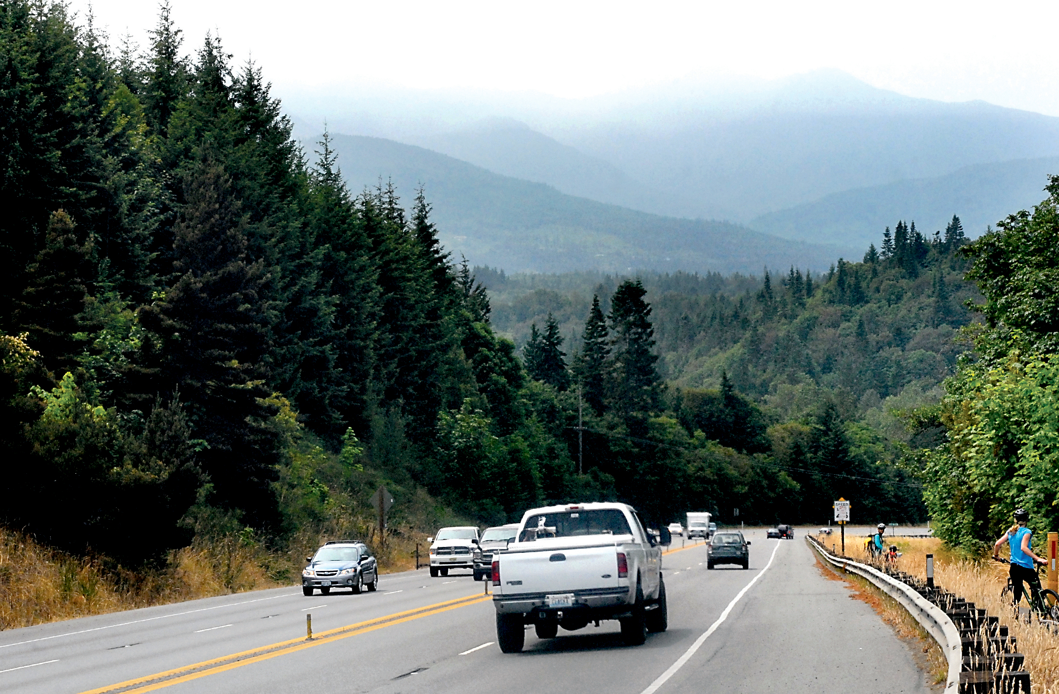 A haze obscures portions of Klahhane Ridge in Olympic National Park as seen from the overlook off U.S. Highway 101 at the top of the Morse Creek “S” curve east of Port Angeles on Tuesday.  — Photo by Keith Thorpe/Peninsula Daily News