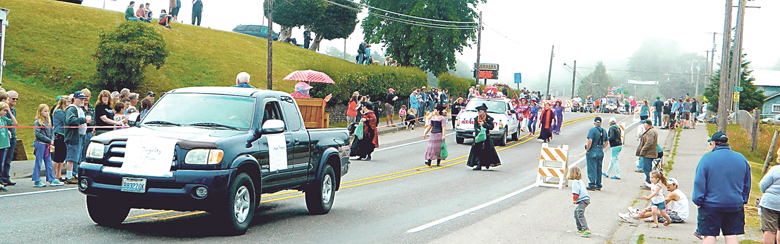 Spectators enjoy the 2014 Grand Parade at Clallam Bay-Sekiu Fun Days in Clallam Bay.