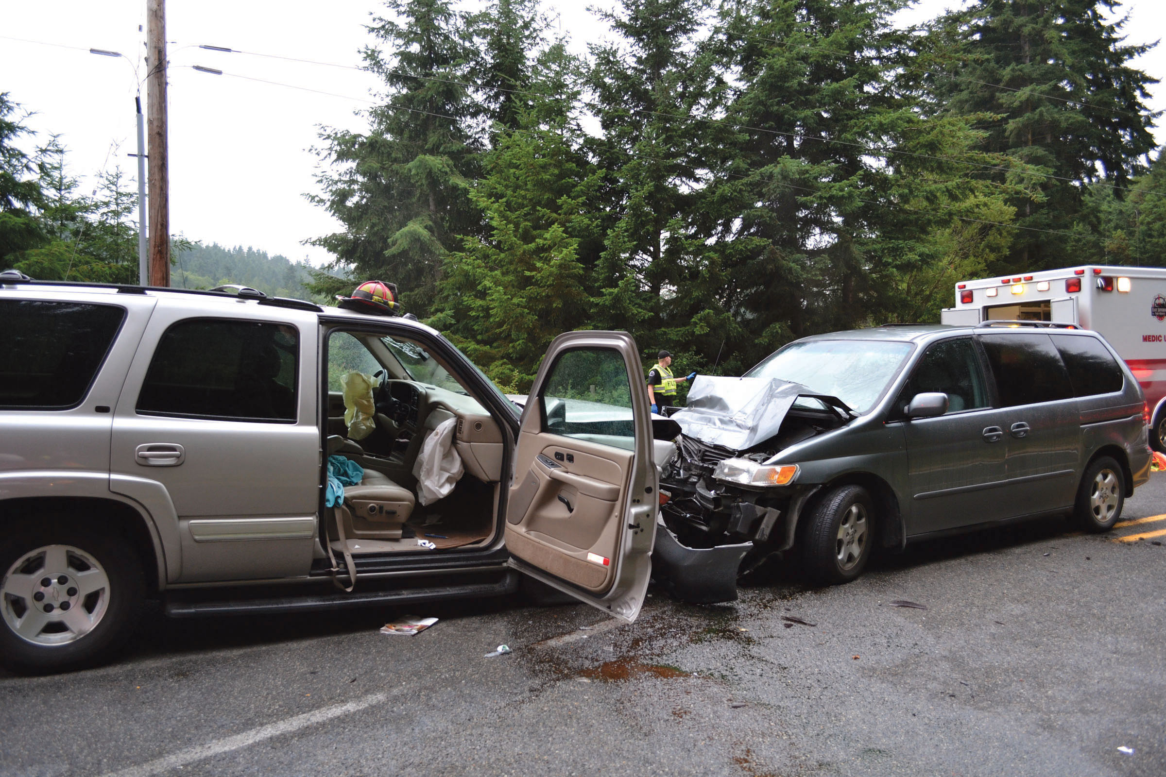 Two adults and a child were airlifted to Harborview Medical Center in Seattle after a two-car head-on collision Saturday at the intersection of West Hastings Avenue and Cape George Road. —Photo by Bill Beezley/East Jefferson Fire-Rescue