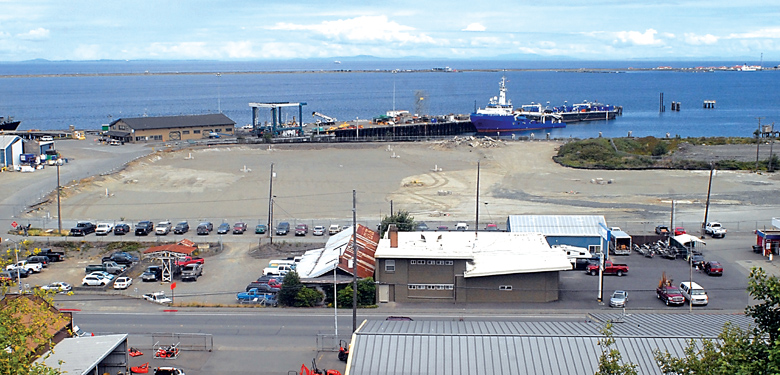 The site of the former Peninsula Plywood mill in Port Angeles sits cleared and vacant