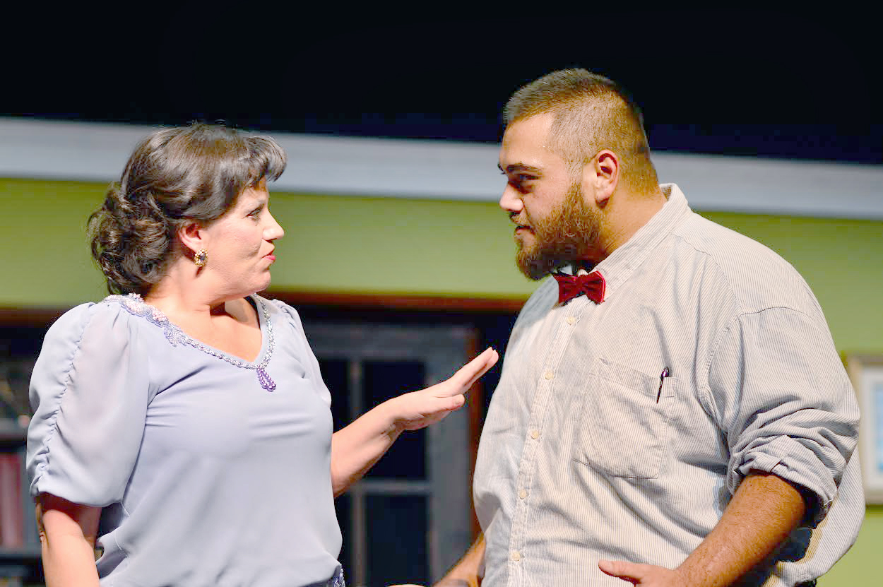 Dynara Rystrom and Kai Lavatai spar in “The Real Inspector Hound