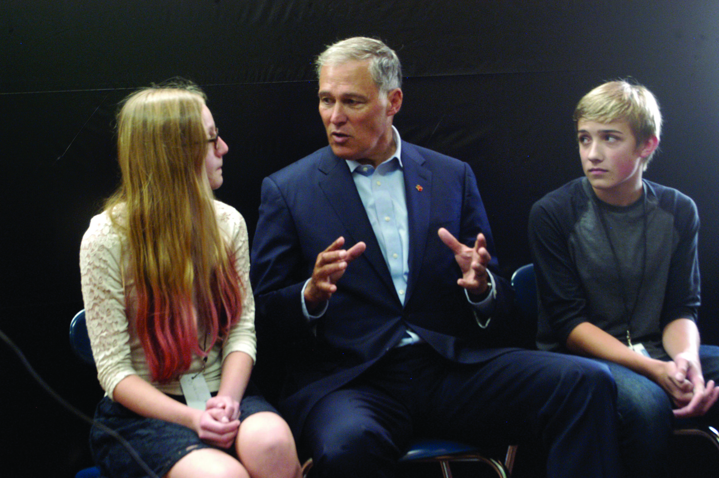 Gov. Jay Inslee speaks to Stevens News Network anchors Morgan Mitchell