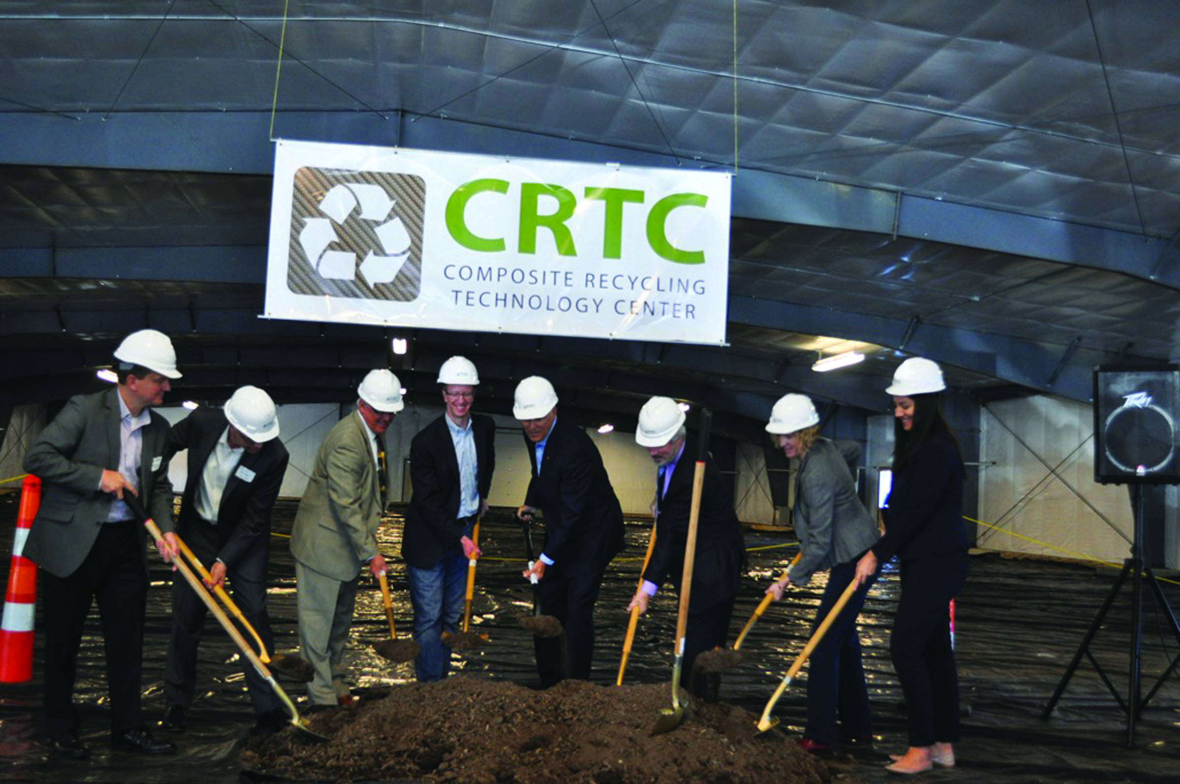 Dignitaries wield shovels during a ceremonial groundbreaking Monday at the Composites Recycling Technology Center site in Port Angeles. From left are Timothy Kirk