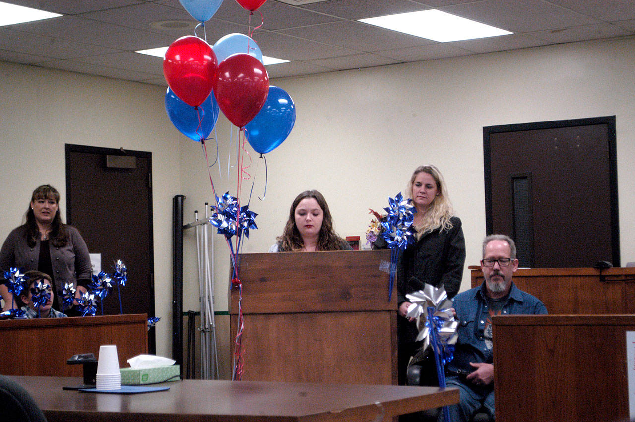 Winter Holmgren, 17, speaks of her experiences in the foster care system prior to her adoption Dec. 17, 2010. (Sarah Sharp/Peninsula Daily News)