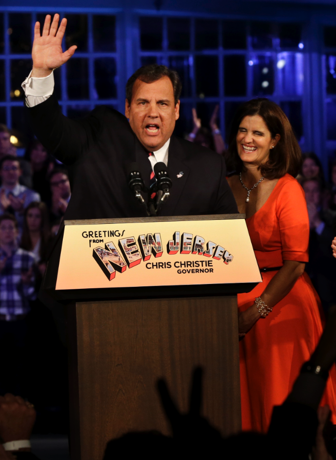 Republican New Jersey Gov. Chris Christie waves as he stands with his wife Mary Pat as they celebrate his election victory in Asbury Park